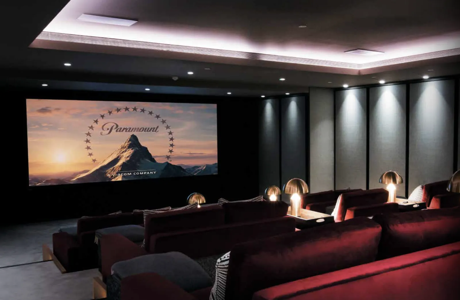 In home movie theater with a movie screen